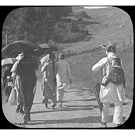 Chinese women walking at Angel Island with umbrellas<br/>